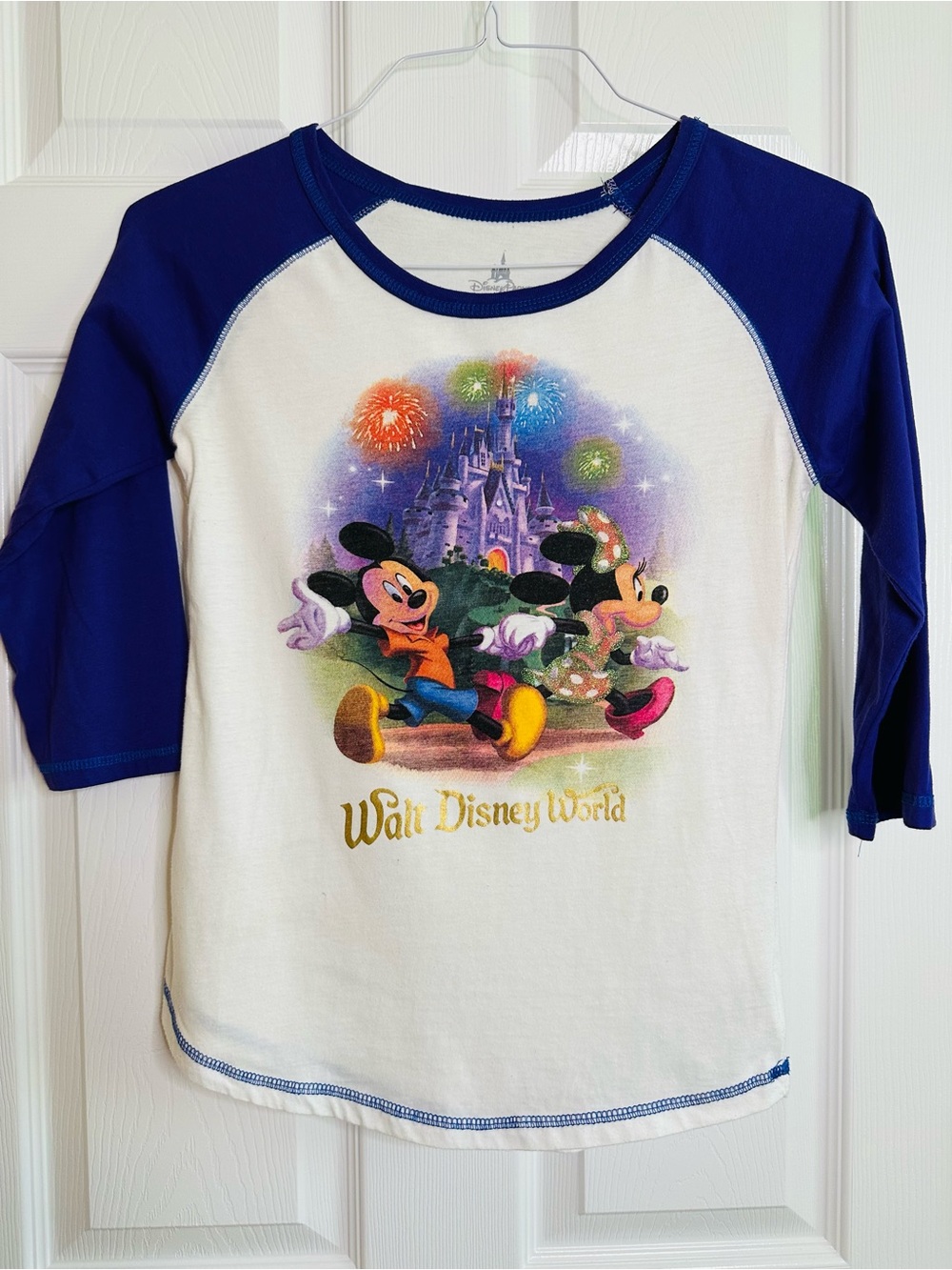 Disney White and Blue Baseball Tee with Mickey & Minnie Castle Fireworks Graphic